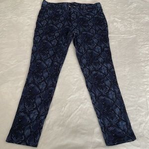 Jean style stretch pants with snake skin pattern